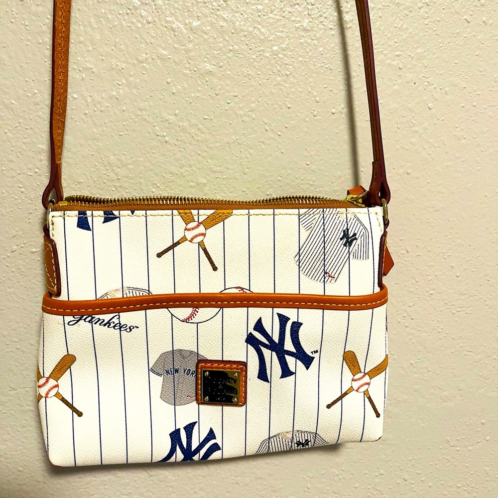 Dooney & Bourke crops over New York Yankees purse